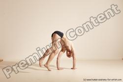 Underwear Gymnastic poses Man White Slim Bald Brown Dancing Dynamic poses Academic